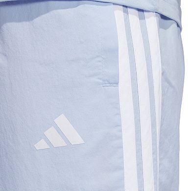 Women's adidas Essentials 3-Stripes Woven 7/8 Sportswear Pants