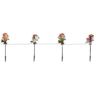 Northlight Set of 4 Pre-Lit Snoopy and Peanuts Ice Skating Christmas Pathway Markers - Clear Lights