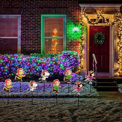 Northlight Set of 4 Pre-Lit Snoopy and Peanuts Ice Skating Christmas Pathway Markers - Clear Lights