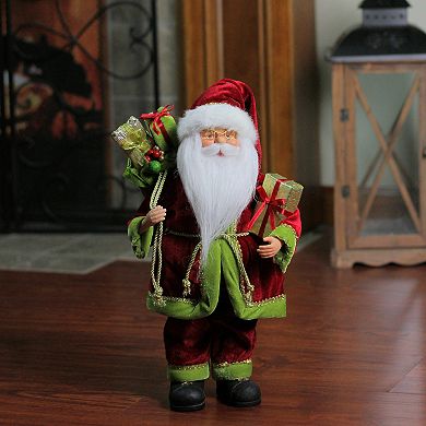 Northlight 16" Red and Green Grand Imperial Santa Claus with Gift Bag Christmas Tabletop Figurine