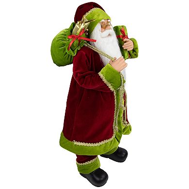 Northlight 24" Red and Green Santa with Present and Gift Bag Christmas Figure