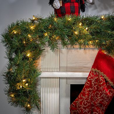 Gerson Luxurious 9-ft. Aspen Spruce Garland with Warm White LED Lights