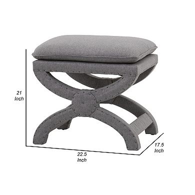 23 Inch Fabric Upholstered Ottoman, Plush Cushioned, Curved X Frame, Gray