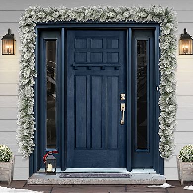 PULEO INTERNATIONAL 20-ft. Flocked Spruce Artificial Garland