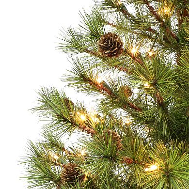 PULEO INTERNATIONAL 4-ft. Pre-Lit Potted Artificial Christmas Tree