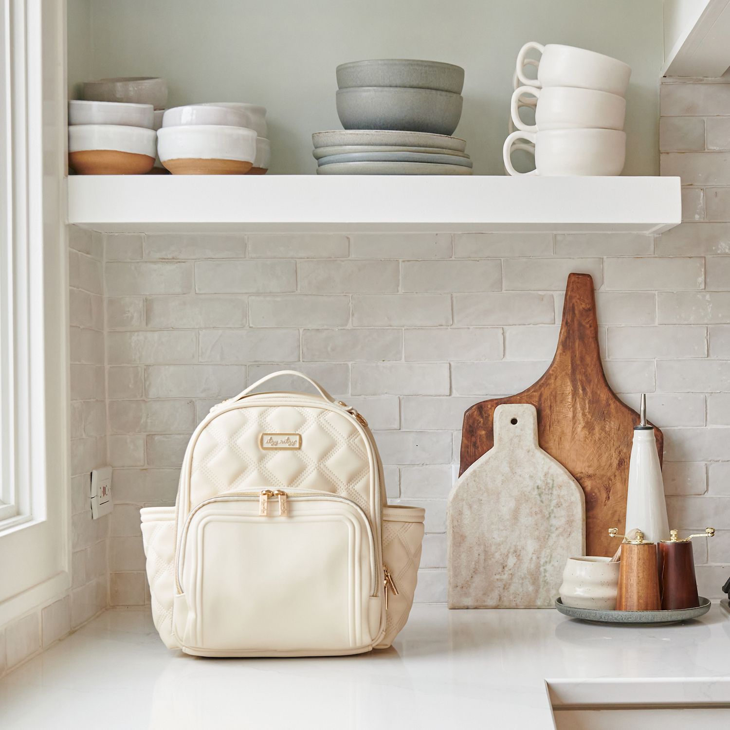 thumbnail image 2 of Itzy Ritzy Mini Plus Diaper Backpack With Changing Pad - Milk & Honey Pattern, 10 Pockets 2 of 13
