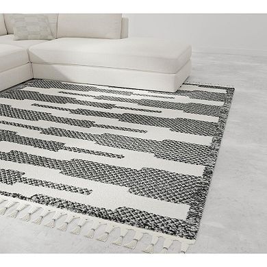 Mason Brooks Ibiza Tasseled Zig-Zag Steppe Print Area Rug
