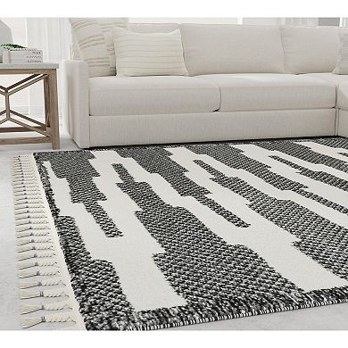 Mason Brooks Ibiza Tasseled Zig-Zag Steppe Print Area Rug