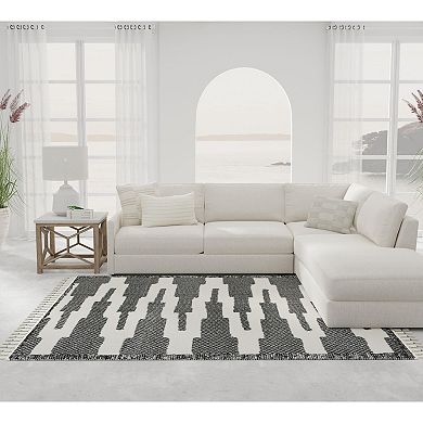 Mason Brooks Ibiza Tasseled Zig-Zag Steppe Print Area Rug
