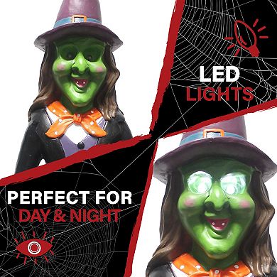 Haunted Hill 4-Ft. Scary Witch Holding a Broom Prelit LED Resin, Indoor or Covered Outdoor Halloween Decoration, Plug-In