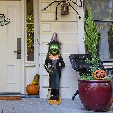 Haunted Hill 4-Ft. Scary Witch Holding a Broom Prelit LED Resin, Indoor or Covered Outdoor Halloween Decoration, Plug-In