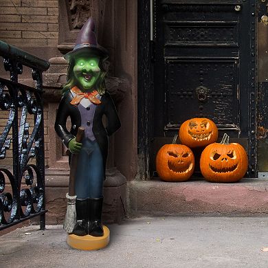 Haunted Hill 4-Ft. Scary Witch Holding a Broom Prelit LED Resin, Indoor or Covered Outdoor Halloween Decoration, Plug-In