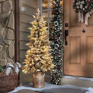 LuxenHome 5ft Pre-lit Potted Artificial Flocked Christmas Tree with Red Holly Berries