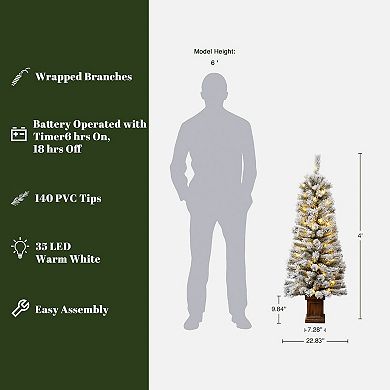 LuxenHome 4ft Pre-lit Potted Battery-operated Artificial Flocked Christmas Tree