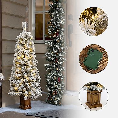 LuxenHome 4ft Pre-lit Potted Battery-operated Artificial Flocked Christmas Tree