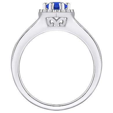 Alyson Layne 10k White Gold Pear Shape Gemstone 1/6 Carat T.W. Diamond Halo Ring