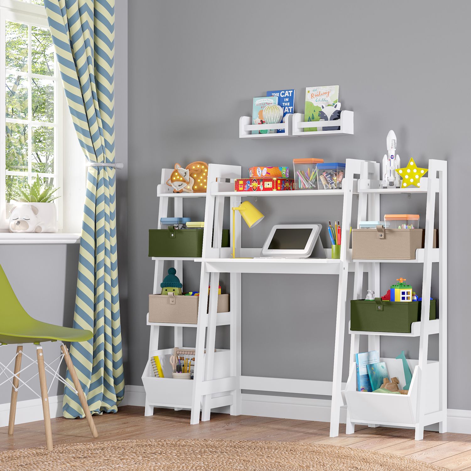 White multi-tier kids’ shelf unit with storage bins and desk area