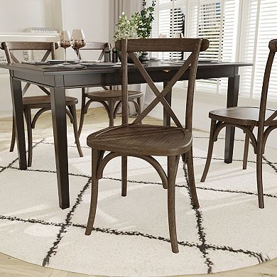 Cross-back chair with dark wood finish around a dining table