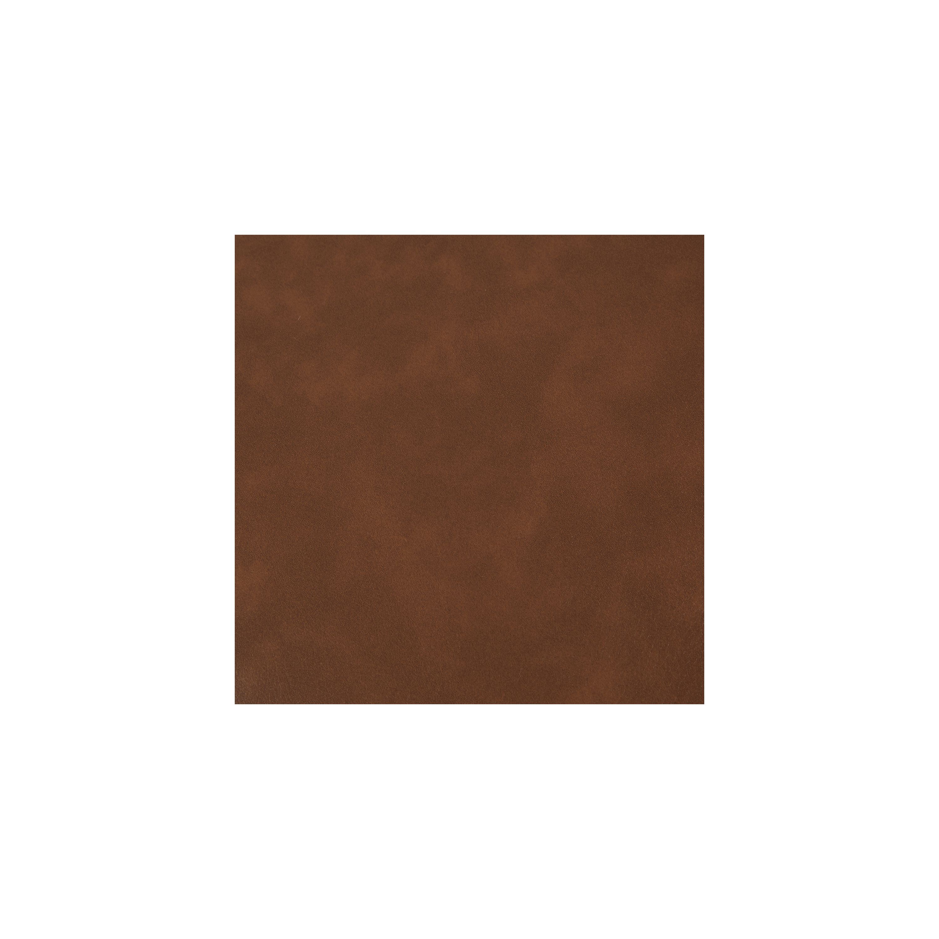 Close-up of the brown faux leather material on the storage ottoman.