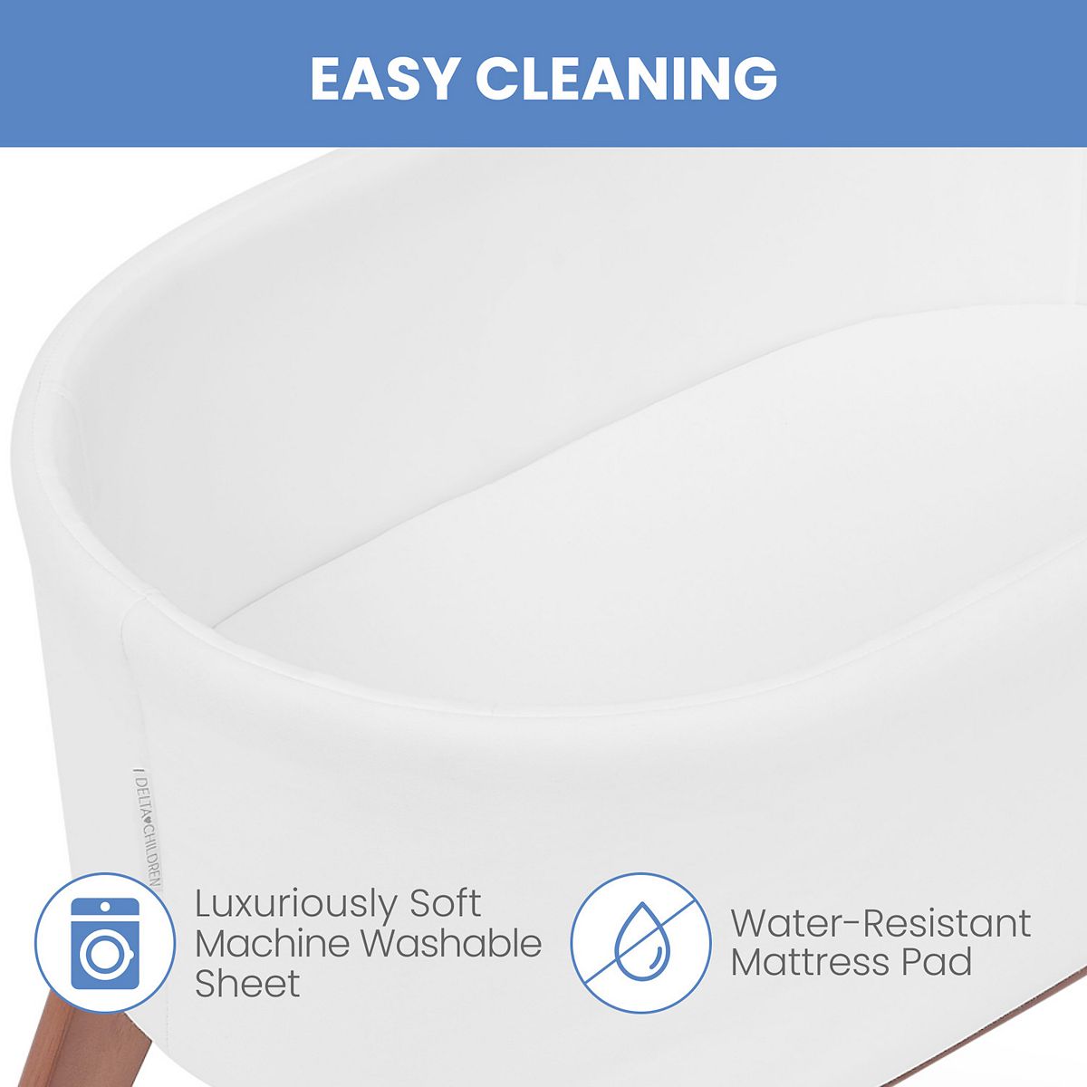 White bassinet with easy-clean washable mattress pad feature