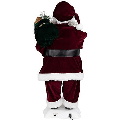 Northlight Animated & Musical Santa Claus Figure with Light-Up Candle Floor Décor