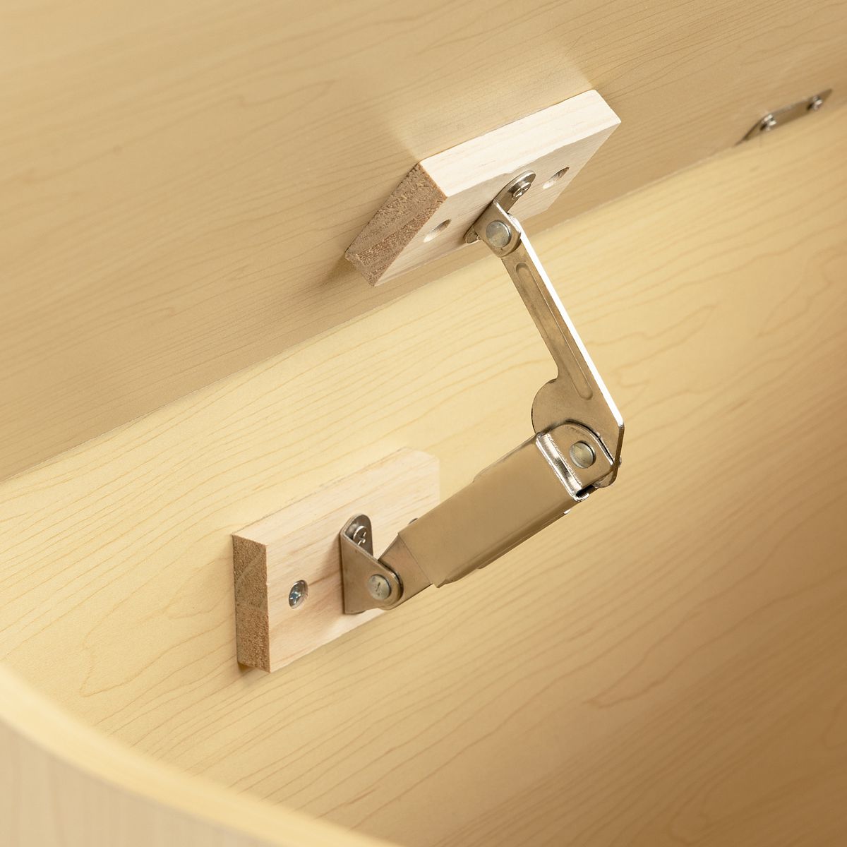 Metal hinge hardware on Humble Crew hinged toy storage bench