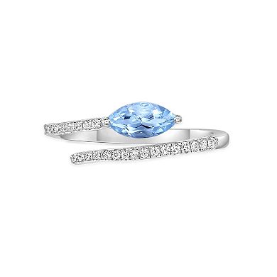 Gemminded 10k White Gold Aquamarine & 1/8 Carat T.W. Diamond Ring