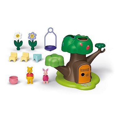 Disney's Winnie The Pooh's & Piglet's Tree House Play Set by Playmobil Junior