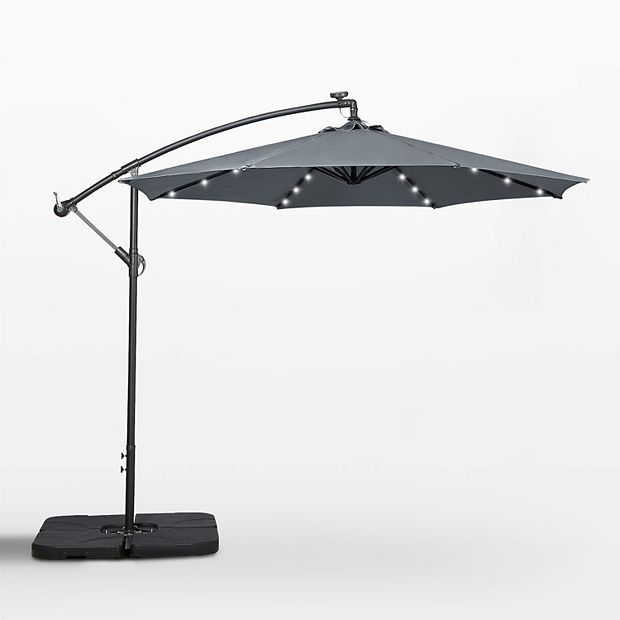 WestinTrends 10 ft Outdoor Patio Solar LED Cantilever Umbrella with Base Weights, Dark Green