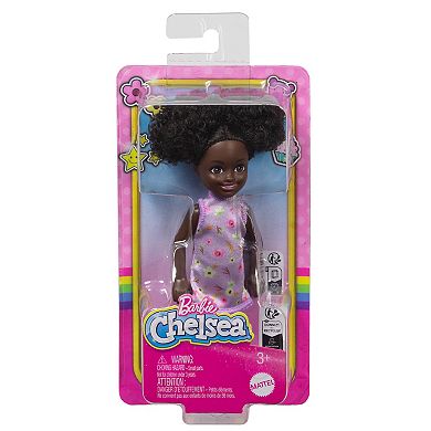 Barbie Chelsea Doll, Small Doll Wearing Removable Purple Floral Dress with Space Buns & Brown Eyes by Mattel