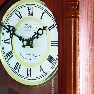 Bedford Collection 25 Inch Wall Clock with Pendulum and Chime in Dark Redwood Oak Finish