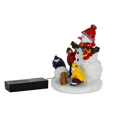 St. Nicholas Square Village Snowman with Children Table Decor