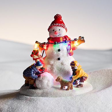 St. Nicholas Square Village Snowman with Children Table Decor