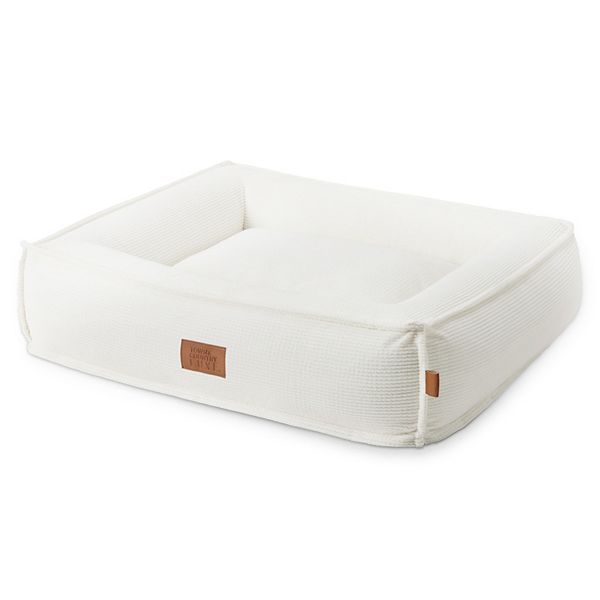TOWN & COUNTRY LUXE CuddleTown Cozy Bolster Pet Bed, Ribbed Corduroy Texture, Machine Washable Cover, Soft, Cozy & Calming, Non-Slip Bottom, Cream, Medium 27"x22"x7"