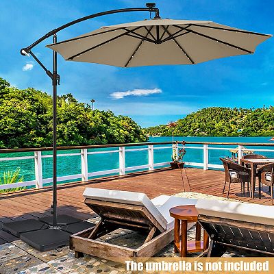 fill patio umbrella base PatioKingdom Market Water Filled  Kingdom helping you secure shade in tight layouts while keeping walkways clear Phewnyzo 42 lbs. HDPE Plastic