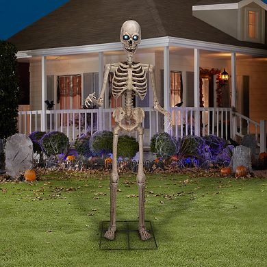 7.75-ft. Gemmy Giant Poseable Skeleton with Light-Up Eyes and Sound ...