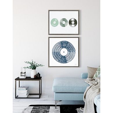 Sylvie Three Records Framed Canvas by Statement Goods