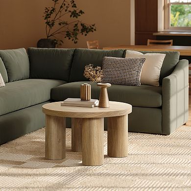 LuxenHome Oak Finish Manufactured Wood Round Coffee Table with 4 Pillar Legs