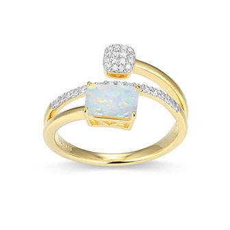 Classic Treasures 18k Gold and Rhodium Over Sterling Silver 1/5 Carat T.W. Lab-Grown Diamond Emerald Cut Bypass Birthstone Ring