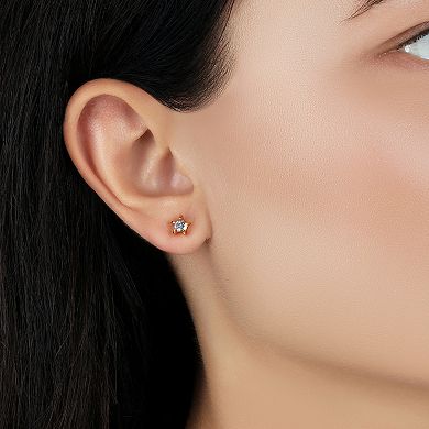 1928 Gold Tone Light Blue Stone Star Stud Earrings