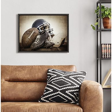 Sylvie Vintage Football Gear Framed Canvas by Shawn St. Peter