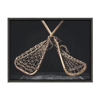 Sylvie Lacrosse Sticks Framed Canvas by Shawn St. Peter
