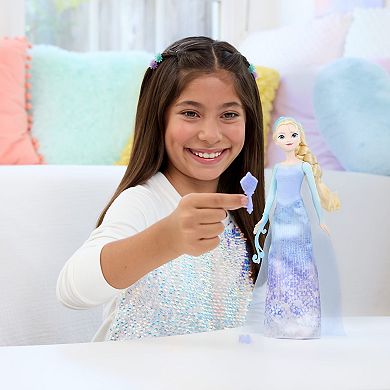 Disney's Frozen Spin & Reveal Elsa Fashion Doll with 10 Surprises