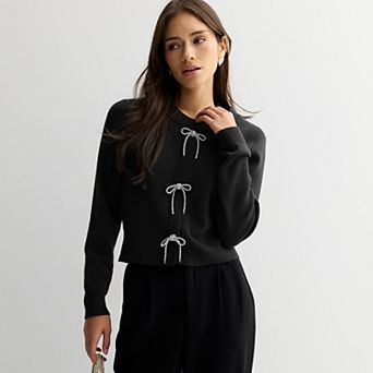 Juniors' madden girl Crewneck Embellished Bow Placket Sweater