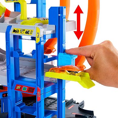 Hot Wheels Mega Loop Garage Playset with Die-Cast Car & Helicopter