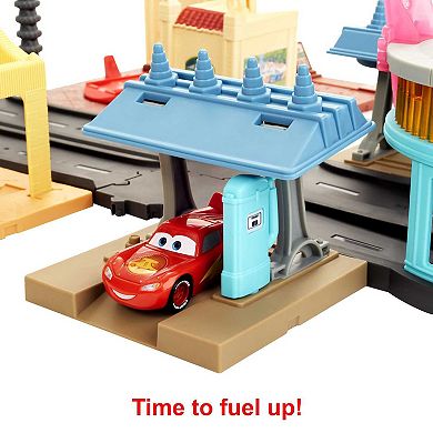Mattel Disney and Pixar's Cars Radiator Springs Tour Playset with 2 Toy Cars