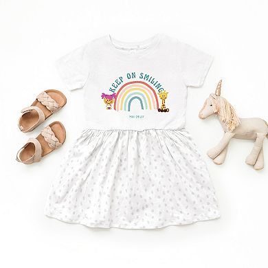 The Juniper Shop Mini Smiley Keep On Smiling Rainbow Toddler Dress