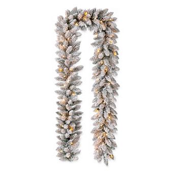 Glitzhome 9ft Pre-Lit Snow Flocked Christmas Garland with Warm White LED Lights and Timer