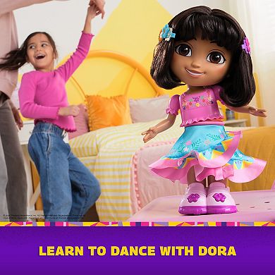 Dora the Explorer Dance With Me Dora Interactive Dancing Doll with 2 Skirts & Bilingual Phrases