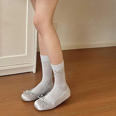 Women's 2 Pairs Eyelet Knit Socks with Faux Leather Bow Detail and Mid-Calf Fit